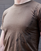 Men's Short Sleeve Tan Berimbau Shirt design closeup
